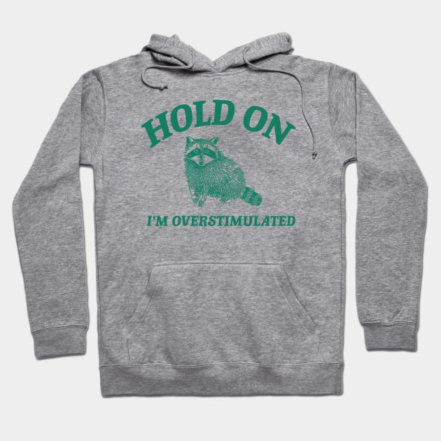Hold On I'm Overstimulated T-Shirt, Retro Unisex Adult T Shirt, Funny Raccoon Shirt, Meme Hoodie by Justin green